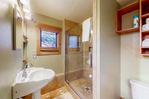 a bathroom with a sink and a shower at Galena Street Getaway in Frisco