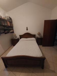 Ένα ή περισσότερα κρεβάτια σε δωμάτιο στο Casa céntrica en Tanti