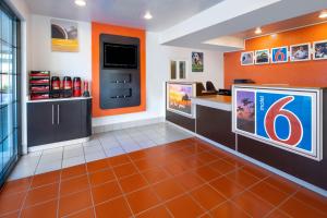 a waiting room at a fast food restaurant at Studio 6 Suites Carpinteria, CA Santa Barbara South in Carpinteria