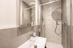 Ένα μπάνιο στο Cozy Studio Apartment