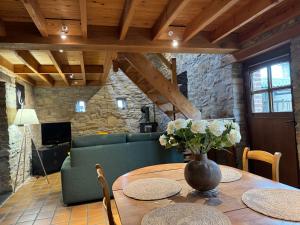Predel za sedenje v nastanitvi Gîte Le fournil