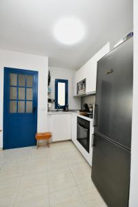 Kuchyň nebo kuchyňský kout v ubytování CASA DRAGOS