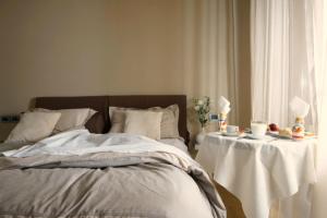 Кровать или кровати в номере Venere B&B