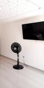 En TV eller et underholdningssystem på Hermoso y Acogedor Apartamento en Las Gaviotas