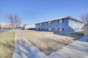 a blue building on the side of a road at Downtown Pierre Apartment about half Mi to River! in Pierre