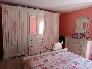 Giường trong phòng chung tại La Stria del Re