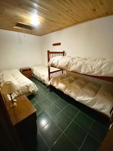 Posteľ alebo postele v izbe v ubytovaní Hospedaje Los Nietos