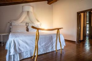 Postel nebo postele na pokoji v ubytování Il Borghetto