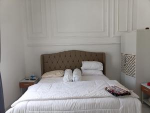 Кровать или кровати в номере Pesona Halimun