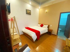 Postel nebo postele na pokoji v ubytování Holly Hostel