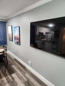 a dining room with a large mirror on the wall at Blue Shark *G15* @ Montrose Private 1BR King Apartment in Houston