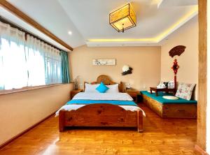 Ένα ή περισσότερα κρεβάτια σε δωμάτιο στο Juxian Boutique Homestay