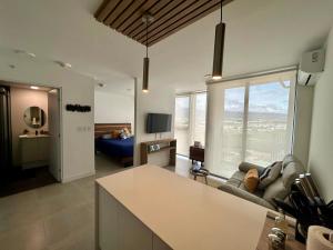 Et tv og/eller underholdning på COZY STUDIO near SABANA CENTRAL PARK