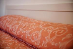 A bed or beds in a room at Hotel Pappas
