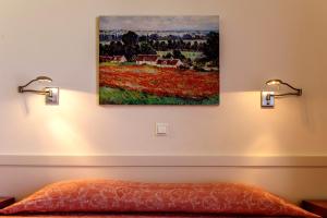 A bed or beds in a room at Hotel Pappas