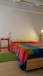 Palazzo Dodici Rondini tesisinde bir odada yatak veya yataklar