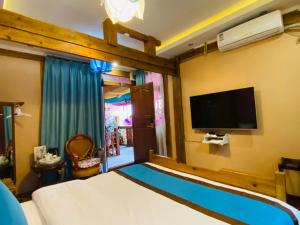 Μια τηλεόραση ή/και κέντρο ψυχαγωγίας στο Juxian Boutique Homestay