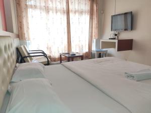 Hotel Rajtara客房内的一张或多张床位
