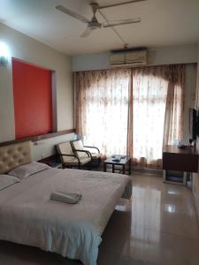 Hotel Rajtara客房内的一张或多张床位