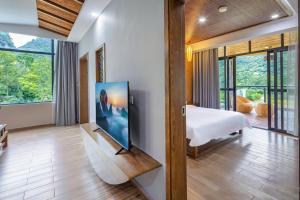 טלויזיה ו/או מרכז בידור ב-Qingshan Yuandai Boutique Homestay Yangshuo
