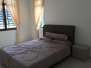Katil atau katil-katil dalam bilik di Bandar Dato Onn P15 Homestay