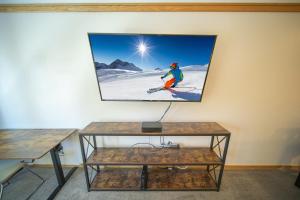 A television and/or entertainment centre at Slopeside 2753a