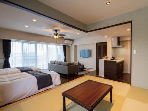 Гостиная зона в Aqua Palace Chatan by Coldio Premium