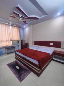 เตียงในห้องที่ HOTEL KANHA INTERNATIONAL, Anuppur
