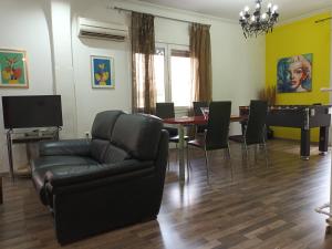 Posedenie v ubytovaní Stunning apartment in the heart of Athens