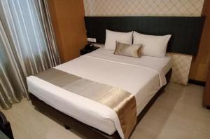 Voodi või voodid majutusasutuse CREW EXPRESS Hotel toas