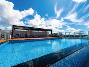 Бассейн в Aqua Palace Chatan by Coldio Premium или поблизости