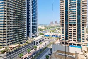 an aerial view of a city with tall buildings at ALH VAcay - Sulafa Tower - 1 Bedroom in Dubai