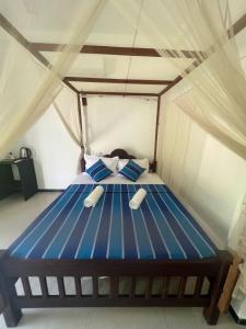 Кровать или кровати в номере PineApple Surf