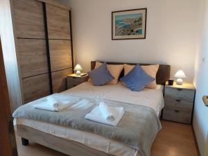 Postel nebo postele na pokoji v ubytování Apartment Ante K A1 + 37 fotografií