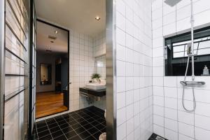 a bathroom with a sink and a mirror at Beforesunset in Ban Chang Kham Luang