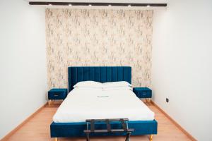Voodi või voodid majutusasutuse SambaSS Boutique Apartment toas