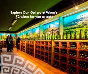 a wine store with a display of wine bottles at Hotel Galatea in Mladá Boleslav