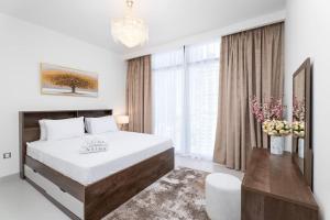 Postel nebo postele na pokoji v ubytování Nasma Luxury Stays - Light and Airy 1 Bedroom Apartment in The Cove