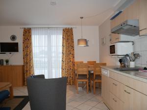 Kuchyň nebo kuchyňský kout v ubytování Villa Maria-Gabriele Whg 01 Kölpinsee Usedom