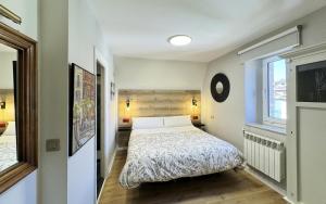 En eller flere senge i et værelse på Posada Villa Rosa