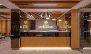 a view of the front desk of a dermatologist office at Treebo Tryst D Consulate in Hyderabad