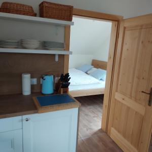 Voodi või voodid majutusasutuse Apartmány Marie Albeř toas