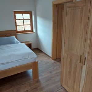 Voodi või voodid majutusasutuse Apartmány Marie Albeř toas