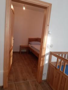 Voodi või voodid majutusasutuse Apartmány Marie Albeř toas