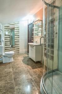 Kylpyhuone majoituspaikassa Apartments & Rooms - Konak Vukasinovic