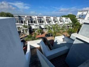 an external view of a large white building at Villa 15 - 2 BHK villa in Pondicherry in Marakkānam