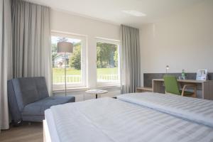 Ein Bett oder Betten in einem Zimmer der Unterkunft St. Bonifatius