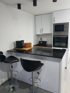 Virtuvė arba virtuvėlė apgyvendinimo įstaigoje Aaki Apartment Diegten II