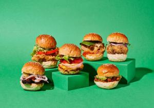 a group of different types of hamburgers on boxes at Hotel Graphy Nezu in Tokyo
