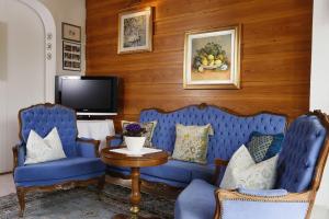 TV a/nebo společenská místnost v ubytování Hotel Tiffany